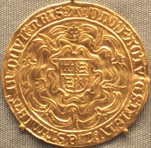 A sovereign  - A sovereign is a gold coin minted by the United Kingdom.The name 'sovereign' comes from the majestic and impressive size and portraiture of the coin, the earliest of which showed the king facing, seated on a throne, while the reverse shows the Royal coat of arms on a shield surrounded by a Tudor double rose.It was first issued in 1489 for Henry VII of England and still in production as of 2009.While the coin typically had a nominal value of one pound sterling or 20 shillings, the sovereign was primarily an official piece of bullion with no mark of value anywhere on the coin itself.