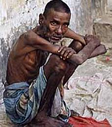 Poor indian - A poor man in the streets of India.