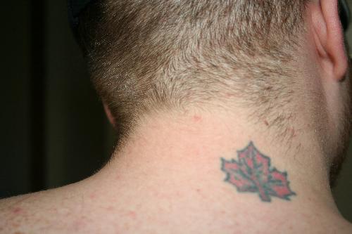 Tattoo on my Neck - This is a picture of the Tattoo on my neck. It is of a Red Maple Leaf. To me it represents the cycle of nature and life, as well as the pride I have in my Country.