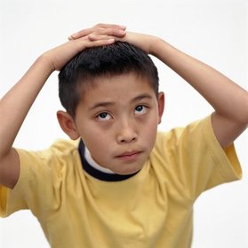 Kids have problems too - This picture depicts a young mind trying to think of the best solution to his problem at hand. He thinks really carefully and not in any rush about his next step. He is not in any way will give up until he solve the problem. He will endure whatever it takes for him to get the answer.