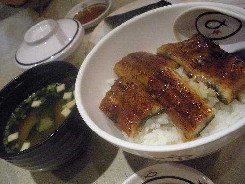 sushi - Una don set...  Unagi is a Japanese name for fresh water ell. So, unagi don is a kind of Japanese food, which is a grilled ell with a sweet sauce. There are 2 styles of grilled ell, one is kanto region style and another one is kansai region.Kanto region in which the ell will roasted 1st, smothered and finally grilled it with sauce. Where kansai region, which is grilled with sauce only. Unagi is my favorite food, I always ate it at the Sushi King's restaurant or Zan Mai restaurant that available in my country.