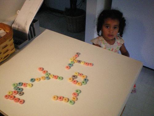 Family Loves Mylot - A snap shot of the 2yr old watching mom play with the cereal for mylot