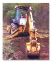 Heavy Equipment - A backhoe on a constuction site.