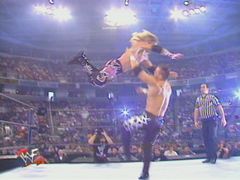 wwe - It is a fight where Edge jumps on someone.