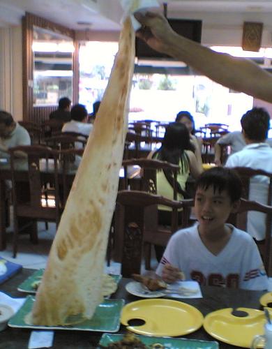 Roti Tissue - This is an Indian food, children loves them very much.
It's crispy, sweet and yummy...like an extremely thin pancake!
It is called 'roti tissue' or 'tissue bread'