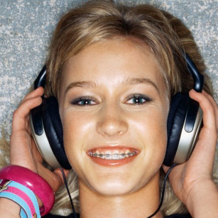 a cute girl listening to music - a super cute girl listening to some music and enjoying it