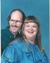 Wedding pic - Just a pic taken at a studio minus our daughter since she wasn't born yet. lol