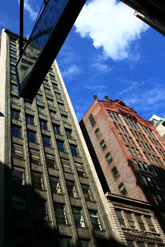 Buildings on 32nd St. - I was sitting on the sidewalk waiting for my boyfriend to get back from an interview and I took this picture.