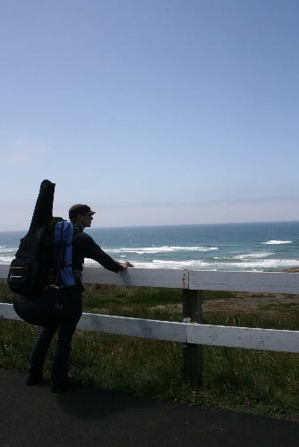 Bill with his Backpack - Bill looking out to the Oregon Coast in Newport, OR. when we first started our trip.
