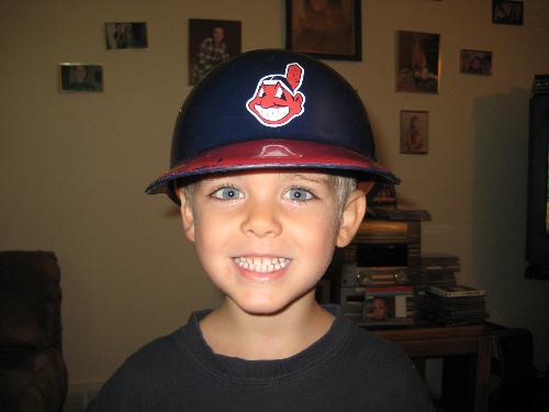 My Grandson Dorian, Jr. - This was taken with a Cleveland Indians helmet on, since both Dorian's dad and grandfather are Boston fans! Love aggrating them about being an Indians' fan and they will get their dander up!!
