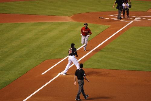 Astro Running - Astro player about to be thrown out at first, Chase Field, Phoenix, Arizona, August 29, 2009