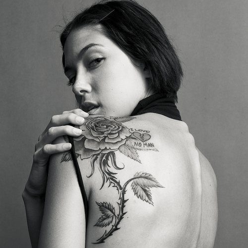 Rose tattoo - Rose tattoo on the back of a cute girl