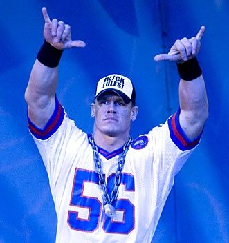 john cena  - its word life 'w' sign it's puts both hand thumb inside and hold by rest finger xpect little of both hand   n join it to form 'W'