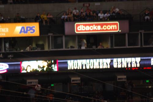 Montgomery Gentry Concert - scoreboard ribbon announcing concert at Chase Field, Phoenix, Arizona, August 29, 2009