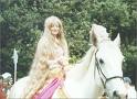 Lady Godiva or Sparks in a wig? - She just had to be a blonde and NOT a redhead! LOL