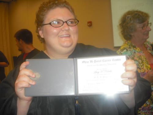 my oldest graduation - Lucy with her diploma
