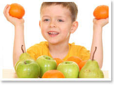A healtier choice - A kid and his choice for fruit that give him the natural daily vitamins