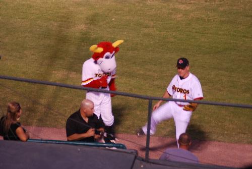 Tuffy the Toro - Tuffy and player line dancing before game at Hi Corbett, Tucson, Arizona, August 31, 2009