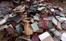 Very large pile of books - A very large and unorganized collection of books.