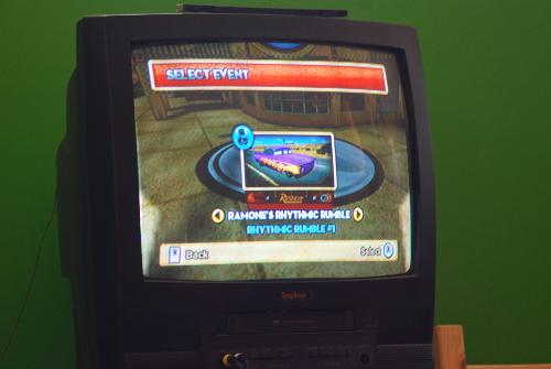 Rhytmic Rumble - screenshot of playing Cars Maters Nationals mini game on the Nintendo Wii