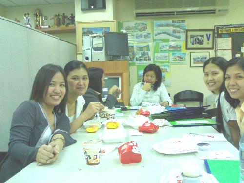 employees under pressure - Photo of a certain group of employees than can still manage to smile under pressure.