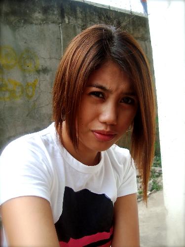 simply me - wow, finally a new haircut! after one year with the long curly brown hair, i finally decided to cut my hair short, and i mean really short. it was a huge decision to make because i wouldnt know how i would look with the new hair cut that i was planning to have. when i was in the boutique i kept on saying 'Oh my God' and everyone else had a smirk on their face because they knew that i might regret cutting my hair short. Imagine, it was so long that i had to grew it for more than a year, then just after a few minutes, it was so short that my nape is so visible already! but, i didn't regret cutting my hair short. I mean, it was all worth it. I had positive feedbacks even though people would say that my long hair was put to waste. But still, i'd think on the brighter side that soon it will grow back, and who knows, years from now I might have that long hair again, or maybe, just maybe, will still be stuck with this one.:)