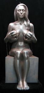 Statue of Angelina Jolie breast feeding 2 infants - This is a statue of Angelina Jolie breast feeding 2 infants.