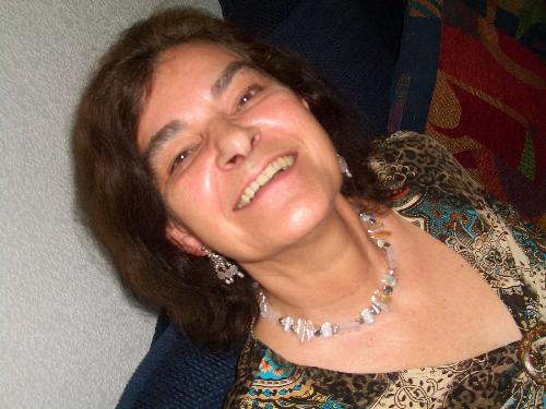Posing with the necklace and earrings I bought in  - I wasn´t going to buy a think but found these earrings and necklace. They called me and I answered. They are silver, river pearls and quartz.