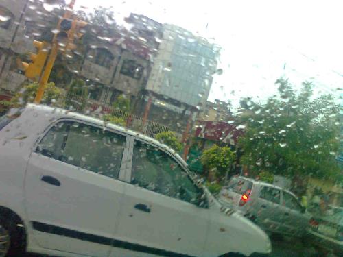 Inside a car - raining plenty outside  - On 10 Sep 2009 , it rained a lot in New Delhi . I captured this Picture while inside the car .