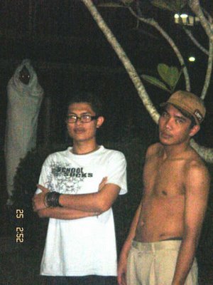 Scary Ghost! - This picture was taken at middle night. The ghost was captured in the camera. Although the cameramen has realized there is a ghost when he is about to review his photo that he's taken that night. In Indonesia, this ghost is called 'Pocong', a name for a ghost that it's body covered with white cloth.