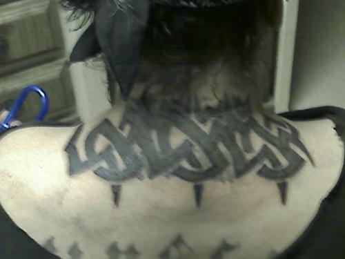 neck ink - birthday ink: large celtic tribal tat on back of neck.