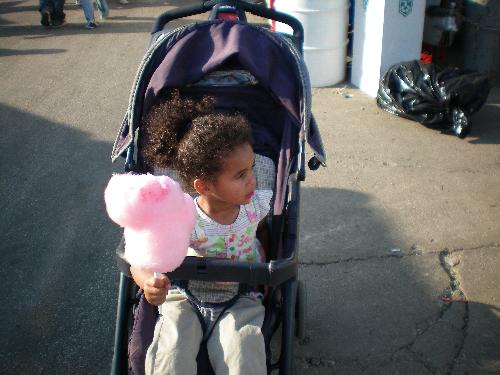 Cotton Candy - 2yr old's firts trip to the fair...enjoying cotton candy and looking at the rides