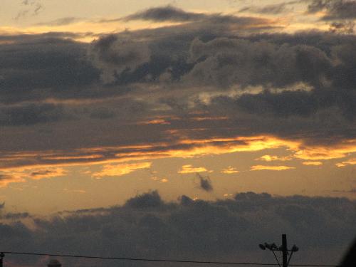 Beautiful Sunrise - This picture was taken from our balcony one morning as we headed out for the day of school and work. I love to take pictures of the sunrise and sunset, they remind me how much we have to be thankful for.