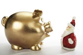 Golden piggy bank  - Golden piggy bank and santa claus figurine