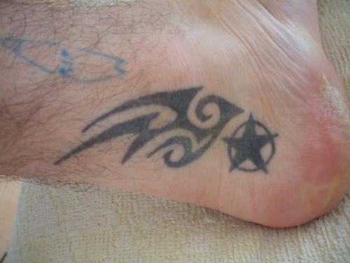 ok tihs is the first set (apart from tribute) - the very first ones i ever did on anyone,me, hurt like hell and thats why they dont look properly inked in!