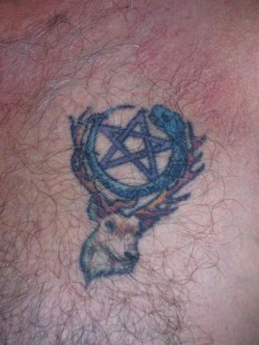 Pentacle tattoo - Pentacle with snake circle mounted on stag antlers.