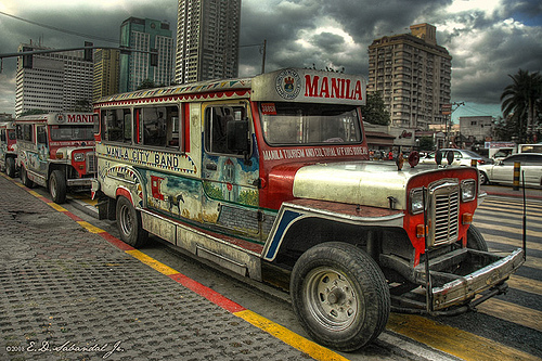 jeepney - This is a photo of an old jeepney in the street of Manila. It is a form of transportation for most of the filipinos.