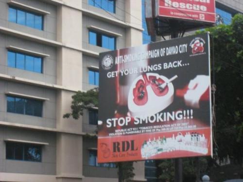 Davao City - Smoke Free City. The billboard at the center of the street in Ateneo Davao School.