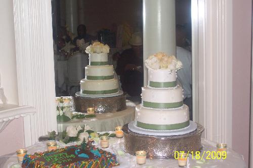 Bride and Groom Wedding Cakes - Bride and Groom wedding cakes on a table at the wedding reception