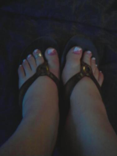 my toenails all done up for a wedding - aren't they cute? sorry the picture is kind of dark.