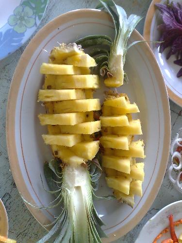 eating food - pineapple