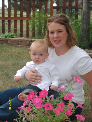 Aiden and I  - This is a pic of My son and I. We are out to my aunt Merry's house. We took these really quick just as a Six month pics for him. It's really beautiful at my aunt's house. It's where I plan on having at least my wedding reception. That is if I ever meet anyone and that man would happen to want to marry me LOL.