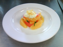 Citrus Salad - Citrus Salad made from culinary institute. Orange, grape fruit, lemon, and some citrus fruits, with creme on the top.