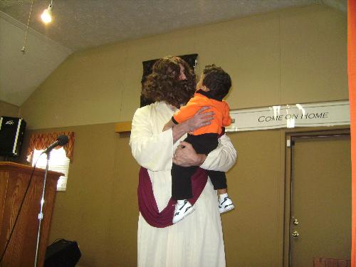 play - man dressed as Jesus performing a play