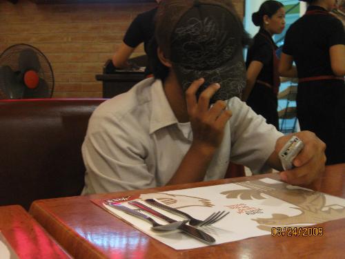 shying from camera - camera shy, that's why u are hiding behind ur cap?