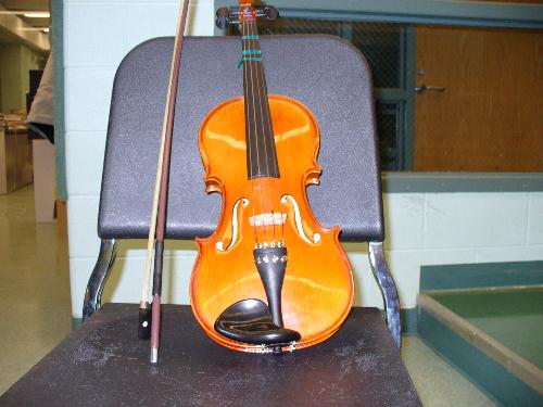 Violin from High School - This is a picture of my violin from high school.I was in Orchestra.