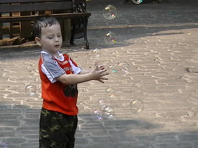 me want bubbles - My oldest son on vaction this past summer. He had this poor lady set there and blow bubbles for him for about a hour. She had to refill the bottle twice. I felt so bad for the lady. I told her I would take over for a while and she said that was her job and that she like doing it.