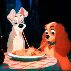 A Date! - This picture is from the classic Disney movie Lady and the Tramp. They are on a date, and they are eating spaghetti and meatball together. A very cute and romantic moment.