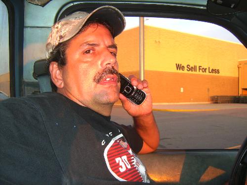 talking - man talking on his cell phone