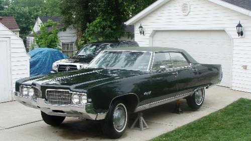 1969 Oldsmobile 98 - My Father-In-Law owned this car since 1969. Sadly, he passed away last year and we inherited it. It is not a muscle car but we like it all the same. Holds many memories for my husband.